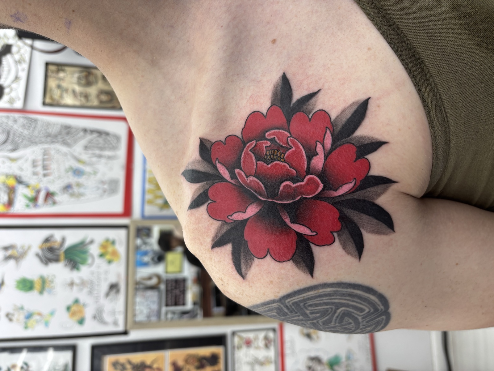 Red peony with black leaves — bold neo-traditional botanical, deep saturation, classic palette
